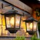 PASAMIC 2 Pack Solar Wall LanternsOutdoor Hanging Lights with 4 Solar PanelsDusk to Dawn Led Outdoor Wall Sconce AntiRust Waterproof Lanterns with Hooks3000K Warm White