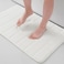 Buganda Memory Foam Bath Mat 24 x 16 Ultra Soft and NonSlip Bathroom Rugs Water Absorbent and Machine Washable Bath Rug for Bathroom Shower and Tub Ivory