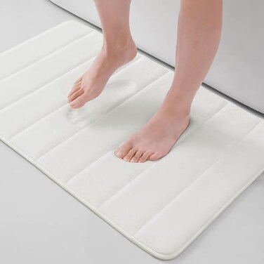 Buganda Memory Foam Bath Mat 24 x 16 Ultra Soft and NonSlip Bathroom Rugs Water Absorbent and Machine Washable Bath Rug for Bathroom Shower and Tub Ivory