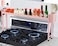 Horynar Over Stove Shelf Stove Top Organizer Shelf for Kitchen with Extra Basket and Hooks Adjustable 27 to 32 Inches Pink Over the Sink Spice Rack for Countertop Pink