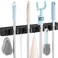 OUTNILI Black Mop Broom Holder Wall Mount with 4 Slots 4 Hooks Rustic Wood Broom Mop Hanger for Pantry Closet Laundry Room Organization Heavy Duty Garden Tool Organizer Black Kitchen Decor