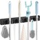 OUTNILI Black Mop Broom Holder Wall Mount with 4 Slots 4 Hooks Rustic Wood Broom Mop Hanger for Pantry Closet Laundry Room Organization Heavy Duty Garden Tool Organizer Black Kitchen Decor