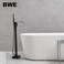 BWE Black Freestanding Bathtub Faucet Floor Mounted Tub Filler Waterfall Tub Spout with Handheld Shower Head Single Handle Solid Brass Construction Bathtub System Matte Black