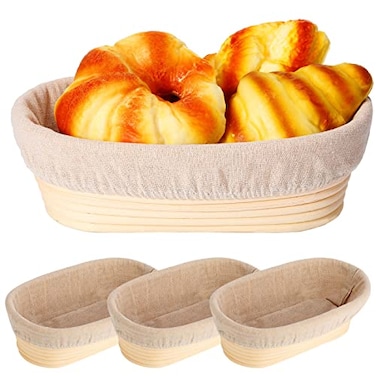 Nuogo 4 Pieces Oval Bread Banneton Proofing Basket 10 Inch Rattan Sourdough Bread Baskets Banneton Dough Proofing Bowls with Liners and Scatters for Home Sourdough BakingOval