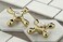 Kingston Brass KS1292AX Restoration Wall Mount Bridge Kitchen Faucet Polished Brass
