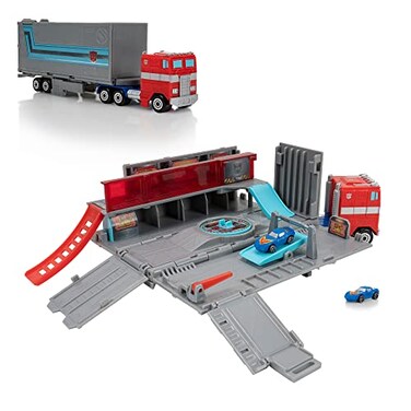 Micro Machines Optimus Prime Hauler PLAYSET Converting Playset with Eight Unique Actions Zones and Exclusive Autobot Corvette
