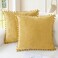CaliTime Throw Pillow Covers Decorative 20 X 20 Inches Pack of 2 Cozy Solid Dyed Soft Chenille Cushion Cases with Pom Poms for Couch Sofa Bed Living Room Home Gold