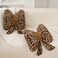 GKWW 2Pcs Leopard Print Bow Throw Pillow Furry Bow Plush Pillows Cute Flower Plush Pillow Cheetah Home Decor Stuffed Bow Lumbar Pillow for Bed Couch Living Room Decor Brown 16in Bowknot