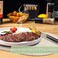 BARTHKIT Placemats for Dining Table Set of 8 NonSlip Heat Resistant Oval Leather Placemat Double Layer Waterproof Table Mats Easy to Clean for Kitchen Dining Room Coffee Office Table Beige