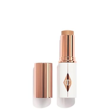 Charlotte Tilbury Unreal Skin Tint Sheer Glow Hydrating Foundation Stick Cream Foundation Makeup with SheertoLight Coverage a Buildable Formula Blurring Smoothing Nourishing 6 Medium