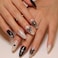 KRTBKR 24Pcs Black Press on Nails Medium Almond Fake Nails 3D Silver Bow Pearl Star Glitter Design Full Cover Stick on Nails Artificial Nails Gothic False Nails Y2k Glue on Nails for Women Acrylic Nai