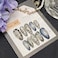 WBRRFJJ 24Pcs Black Press on Nails Medium Almond Handmade Fake Nails with 3D Irregular Chrome Y2k Design Gothic False Nails Pearl Gems Full Cover Artificial Glue on Nails Cute Stick on Nails for Women