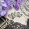 WBRRFJJ 24Pcs Black Press on Nails Medium Almond Handmade Fake Nails with 3D Irregular Chrome Y2k Design Gothic False Nails Pearl Gems Full Cover Artificial Glue on Nails Cute Stick on Nails for Women