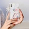 Shinymore Compatible with iPhone Xs CaseCute Clear Flowers Bear Camera Protector with Lovely Strap Bracelet Chain Girls Women Cover