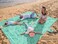 WEKAPO Beach Blanket Waterproof Sandproof Oversized Extra Large Beach Mat Sand Free Lightweight Compact Sand Free Mat with 6 Stakes 4 Corner Pockets Turquoise Shells 8 x 7 FT 14 Person