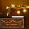 UZKEW Christmas Garland with Snowflake Lights 30 Led 10ft Battery Operated 8 Lighting Modes Timer Pine Cones Red Berry Garland Indoor Outdoor Office Decor Xmas String Light Mantle Decorations Warm Whi