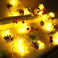 UZKEW Christmas Garland with Snowflake Lights 30 Led 10ft Battery Operated 8 Lighting Modes Timer Pine Cones Red Berry Garland Indoor Outdoor Office Decor Xmas String Light Mantle Decorations Warm Whi
