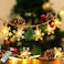 UZKEW Christmas Garland with Snowflake Lights 30 Led 10ft Battery Operated 8 Lighting Modes Timer Pine Cones Red Berry Garland Indoor Outdoor Office Decor Xmas String Light Mantle Decorations Warm Whi