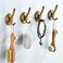 DMYMAT Antique Brass Towel Hooks Vintage Gold Bathroom Robe Hooks Wall Mounted 4 Pack Heavy Duty Wall Coat Hooks for Farmhouse Bedroom Kitchen