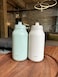 Ello Hydra 64oz Stainless Steel Water Jug with Locking Leak Proof Lid Reusable Half Gallon Vacuum Insulated Metal Bottle with Silicone Straw Keeps Drinks Cold All Day Cream