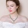EleQueen Womens Silvertone Cubic Zirconia Oval Shape Leaf Necklace Earrings Set For Brides And Weddings Emerald Color