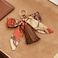 QTMY Silk Ribbon Bow Tassel Bag Pendant Charm Keyring Keychain for Women Purse Handbag Decor Brown