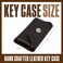 TheAntiq Genuine Leather Key Organizer Wallet Compact Key Holder Case with 6 Hooks Cash Pocket Snap Closure Keychain with Carabiner for Car Home Keys Brown