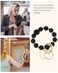 WEESMILE Silicone Key Ring Bracelet Cute Keychain Wristlet with 2 Key Rings Elastic Car Key Holder Bangle for Women Daisy Black