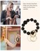WEESMILE Silicone Key Ring Bracelet Cute Keychain Wristlet with 2 Key Rings Elastic Car Key Holder Bangle for Women Daisy Black