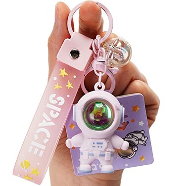 YOU WIZV Astronaut Keychain Cute Kawaii Anime Cool Keychains for Backpacks Space Keychains with Sunset Light for Women Men Boys GirlsPink