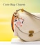 YOU WIZV Cute Airtag Keychain Off White Leather Anime Cow Keychain Bag Charm with Tassel Keychains Accessories Cute Backpack Keychains for WomenGirlsBoys