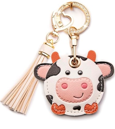 YOU WIZV Cute Airtag Keychain Off White Leather Anime Cow Keychain Bag Charm with Tassel Keychains Accessories Cute Backpack Keychains for WomenGirlsBoys