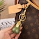 ZACAGO Pear Bag Charm for Women Keychain Purse Accessory with Cute Fruit Design Handbag Decoration and Key Chain Resin Gold Red Pear