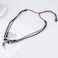 CCBFY Braided Leather Necklace Vintage Style Double Layers Black Tribal Necklace with Charm Cross Pendant Teeth