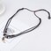 CCBFY Braided Leather Necklace Vintage Style Double Layers Black Tribal Necklace with Charm Cross Pendant Teeth