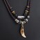CCBFY Braided Leather Necklace Vintage Style Double Layers Black Tribal Necklace with Charm Cross Pendant Teeth