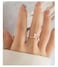 Kokoma Dainty Flower Ring for Women Sparkling Cubic Zirconia Daisy Open Statement Rings Pearl Chic Engagement Promise Ring Wrap Finger Band Pink