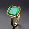 RIZILIA Solitaire Engagement Ring with Emerald Cut Gemstones CZ Simulated Green Emerald Size 6 in 18K Yellow Gold Plated Simple Modern Elegance
