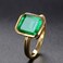 RIZILIA Solitaire Engagement Ring with Emerald Cut Gemstones CZ Simulated Green Emerald Size 6 in 18K Yellow Gold Plated Simple Modern Elegance