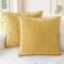 CaliTime Throw Pillow Covers Decorative 18 X 18 Inches Pack of 2 Cozy Solid Dyed Soft Chenille Cushion Cases with Pom Poms for Couch Sofa Bed Living Room Home Gold