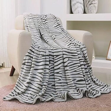 FY FIBER HOUSE Flannel Fleece Throw Microfiber Blanket with 3D Zebra Print50 by 60InchBlack