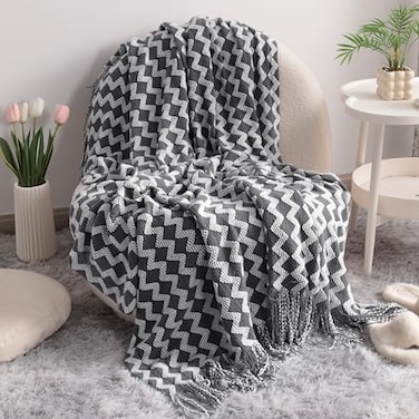 NTBAY Acrylic Knitted Throw Blanket Lightweight and Soft Cozy Decorative Woven Blanket with Tassels for Travel Couch Bed Sofa 51x67 Inches Grey Wave