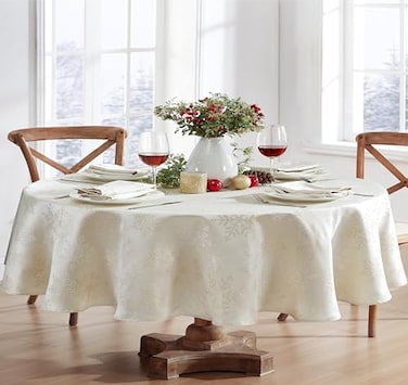 Newbridge Fancy Metallic Snowflake Christmas Fabric Tablecloth 60 x 84 Inch Oval Ivory Gold NoIron Soil Resistant Sparkling Snowflakes Woven Holiday Table Cover
