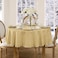 Newbridge 60 x 84 Inch Oval Fabric Tablecloth Elegance Plaid 100 Polyester No Iron Soil Resistant Dining Room Party and Banquet Table Cover Solid Textured Ribbon Gold