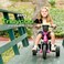 Joovy Tricycoo 41 Kids Tricycle with 4Stages Featuring ExtraWide Front Tire Removable and Adjustable Parent Handle Safety Harness MachineWashable Seat Pad and Retractable Canopy Pink
