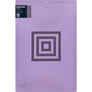 Fiskars Self Healing Cutting Mat with Grid for Sewing Quilting and Crafts 24 x 36 Grid LilacMountain Haze