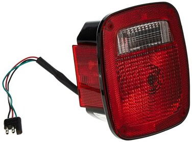 Omix-Ada12403.07Tail Light Assembly, Left, BlackOE Reference: 5758255Fits 1981-1986 Jeep CJ