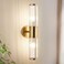 ECOBRT Modern Brushed Brass Vanity Light Fixture 1 Pack, Dual Glass Rods Wall Sconce for Bathroom, Double Light Socket E12 Candelabra Base, Mirror Vanity Lighting (Bulbs Not Included)