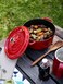 Staub Round Cocotte 26cm Cherry 5.2L Cast Iron Material Matte black inner enamel. Lid with Aroma Rain Structure. Suitable for all types of hobs, incl. induction. Ovensafe. Grill Safe.