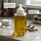 Cuisine Art 1000ml/1 Liter Oil Dispenser Squeeze Bottle &ndash; Food-Safe PE Plastic with Fine-Tip Nozzle Tethered Cap &amp; Embossed Measurements for Cooking Oil Vinegar Sauce &ndash; Square Stable Base